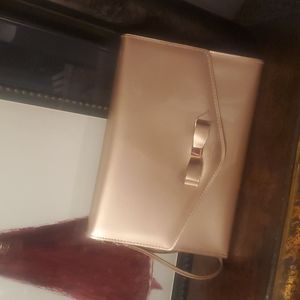 Elegant Gold Clutch with Bow Accent